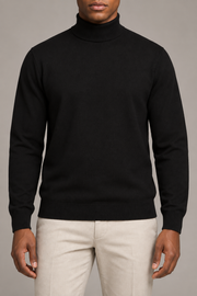 Hero front showing the plain Black turtleneck and fine knit of Still Season Turtleneck Sweater in Black.