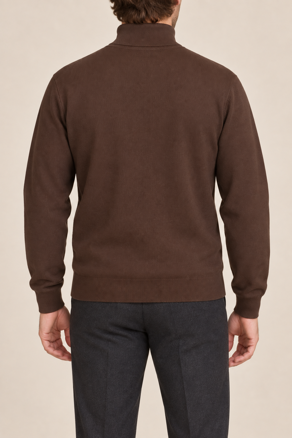 Rear view showing the plain Soil brown back and high collar of Still Season Turtleneck Sweater in Soil.