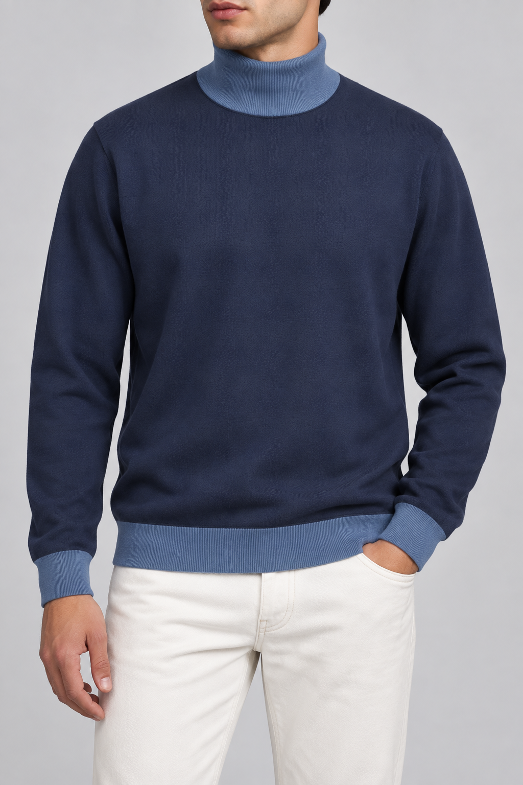 Hero front showing the plain Navy knit with Denim collar and edges of Still Season Turtleneck in Navy with Denim Trim.