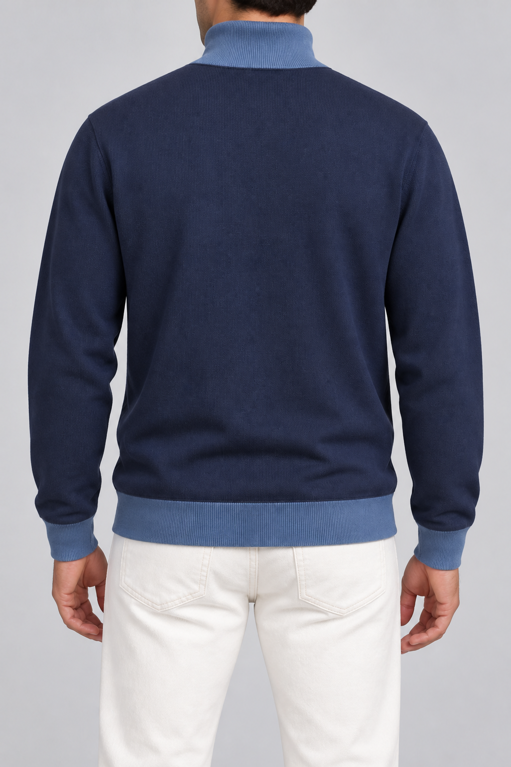 Rear view showing the Navy back and Denim trim of Still Season Turtleneck in Navy with Denim Trim.