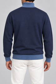 Rear view showing the Navy back and Denim trim of Still Season Turtleneck in Navy with Denim Trim.