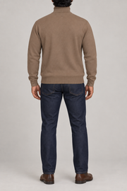 Rear view showing the plain Peanut back and ribbed hem of Still Season Turtleneck Sweater in Peanut.