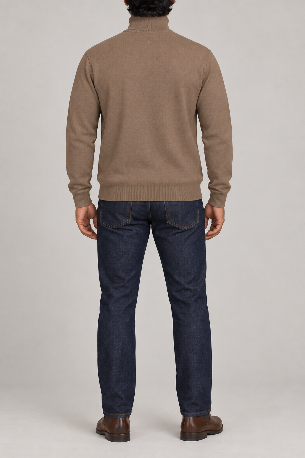 Rear view showing the plain Peanut back and ribbed hem of Still Season Turtleneck Sweater in Peanut.