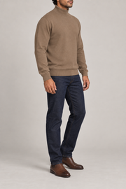 Side view showing the Peanut silhouette and matching edges of Still Season Turtleneck Sweater in Peanut.