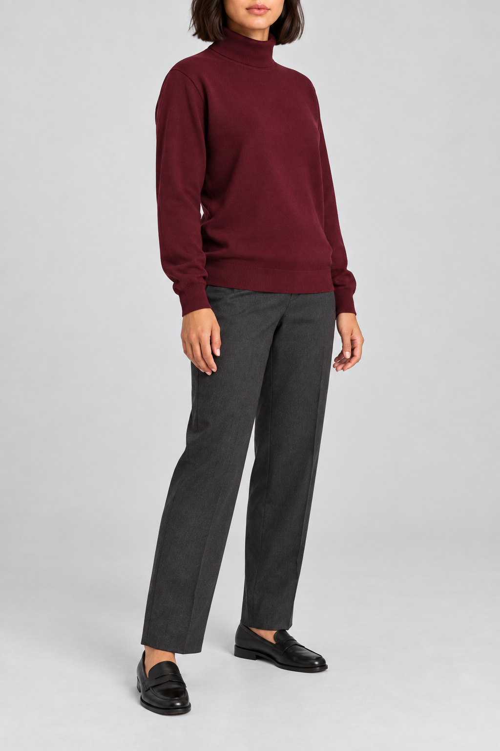 Three-quarter view showing the Burgundy silhouette and matching edges of Soft Horizon Turtleneck Sweater in Burgundy.