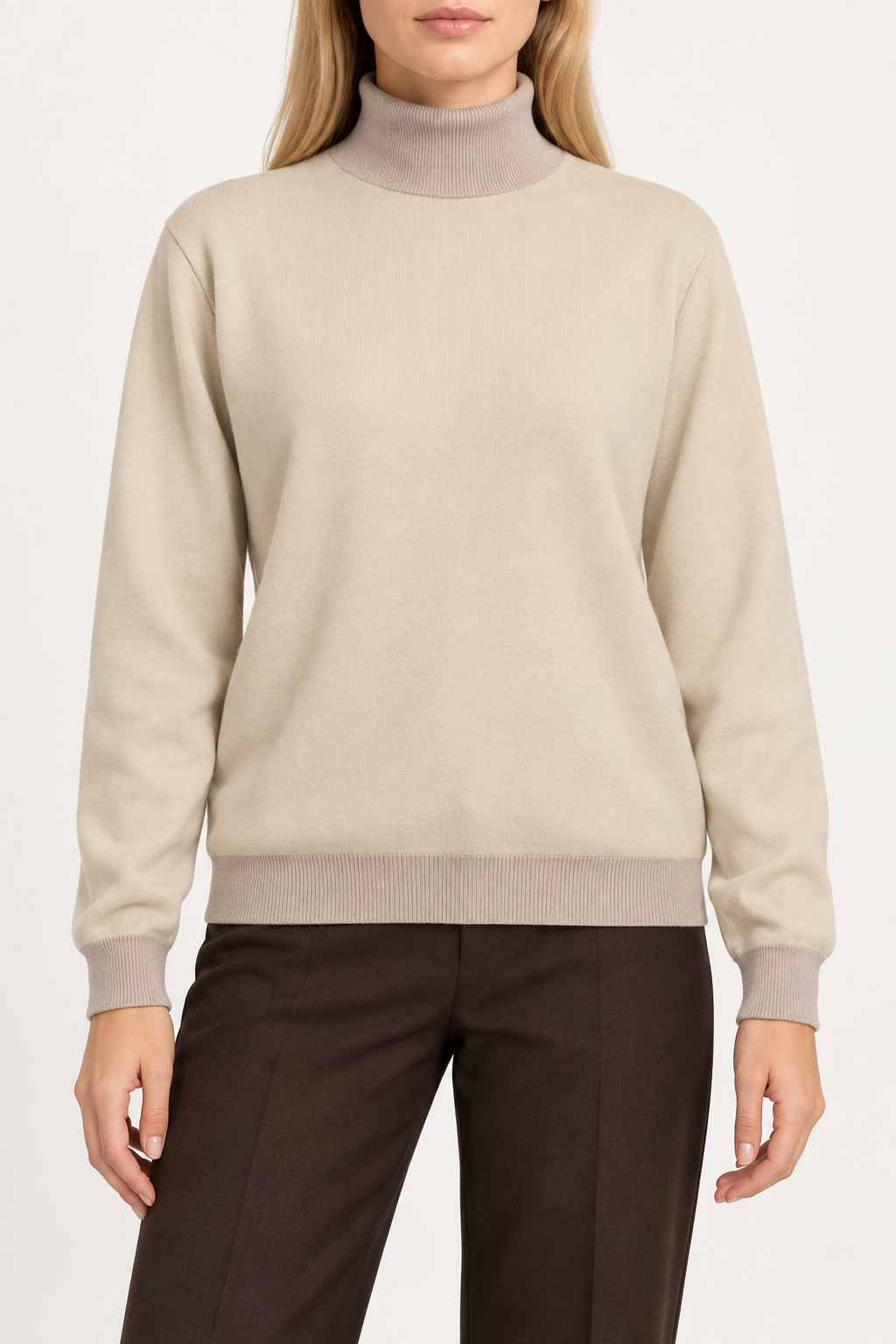 Hero front showing the plain Beige knit with Coco collar and edges of Soft Horizon Turtleneck in Beige with Coco Trim.