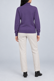 Rear view showing the plain Violet back and ribbed hem of Soft Horizon Turtleneck Sweater in Violet.
