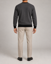 Rear view showing the Charcoal back and Black trim of Quiet Angle V-Neck in Charcoal with Black Trim.
