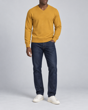 Hero front showing the plain Mustard V-neck sweater of Quiet Angle V-Neck Sweater in Mustard.