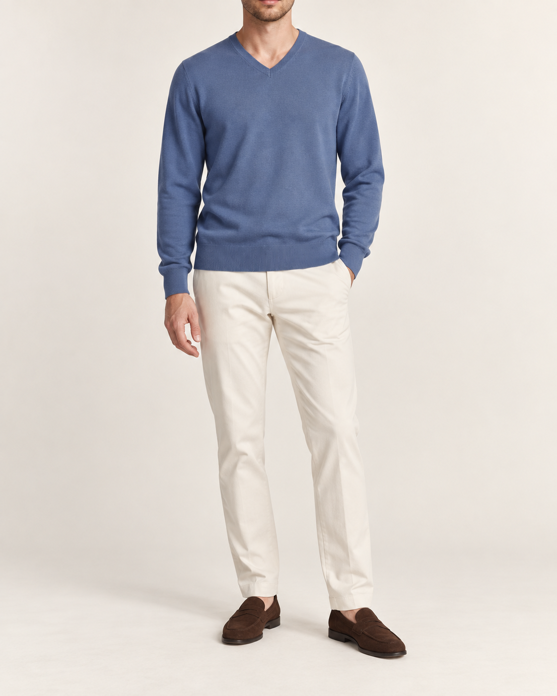 Hero front showing the plain Denim blue V-neck sweater of Quiet Angle V-Neck Sweater in Denim.