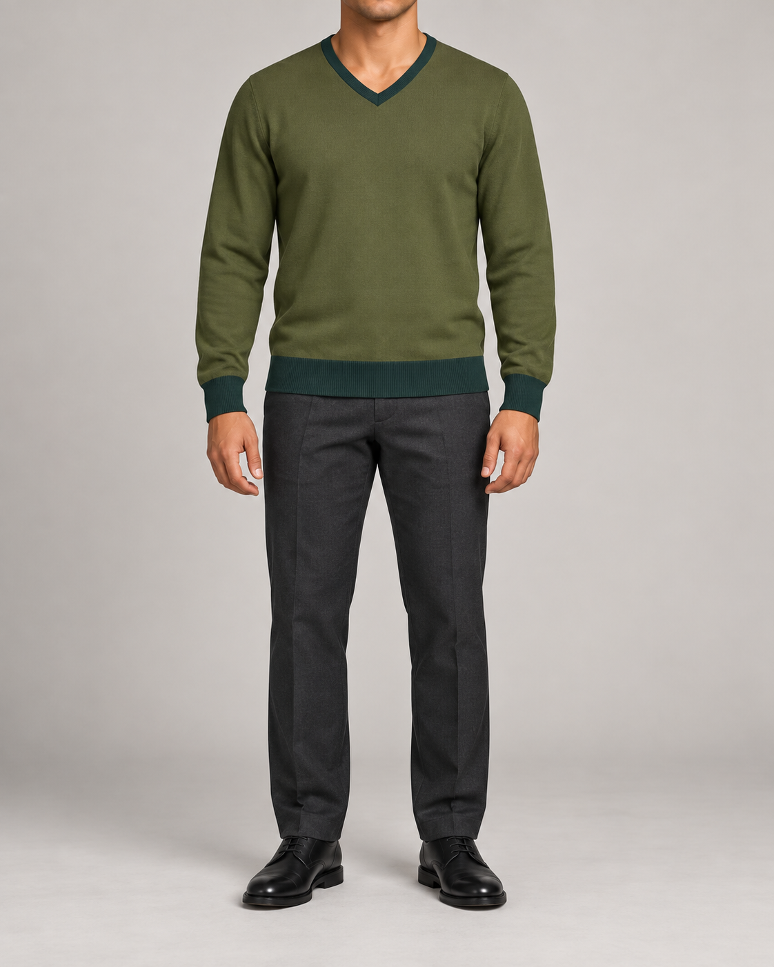 Hero front showing the plain Olive knit and Pine V neckline of Quiet Angle V-Neck in Olive with Pine Trim.