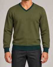 Close-up showing the Pine V neckline and Olive fine knit of Quiet Angle V-Neck in Olive with Pine Trim.