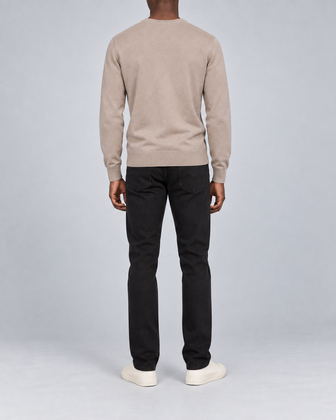 Rear view showing the plain Coco back and tonal hem of Quiet Angle V-Neck Sweater in Coco.