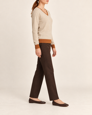 Side view showing the Beige classic fit and Rust trim of Soft Angle V-Neck in Beige with Rust Trim.