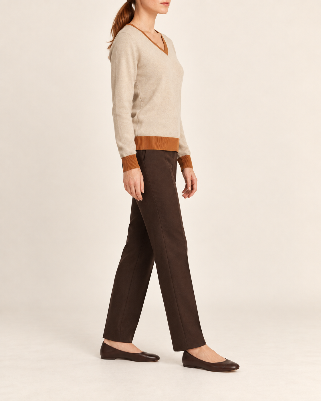 Side view showing the Beige classic fit and Rust trim of Soft Angle V-Neck in Beige with Rust Trim.