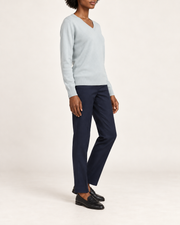 Side view showing the Powder blue classic fit and long sleeves of Soft Angle V-Neck Sweater in Powder.