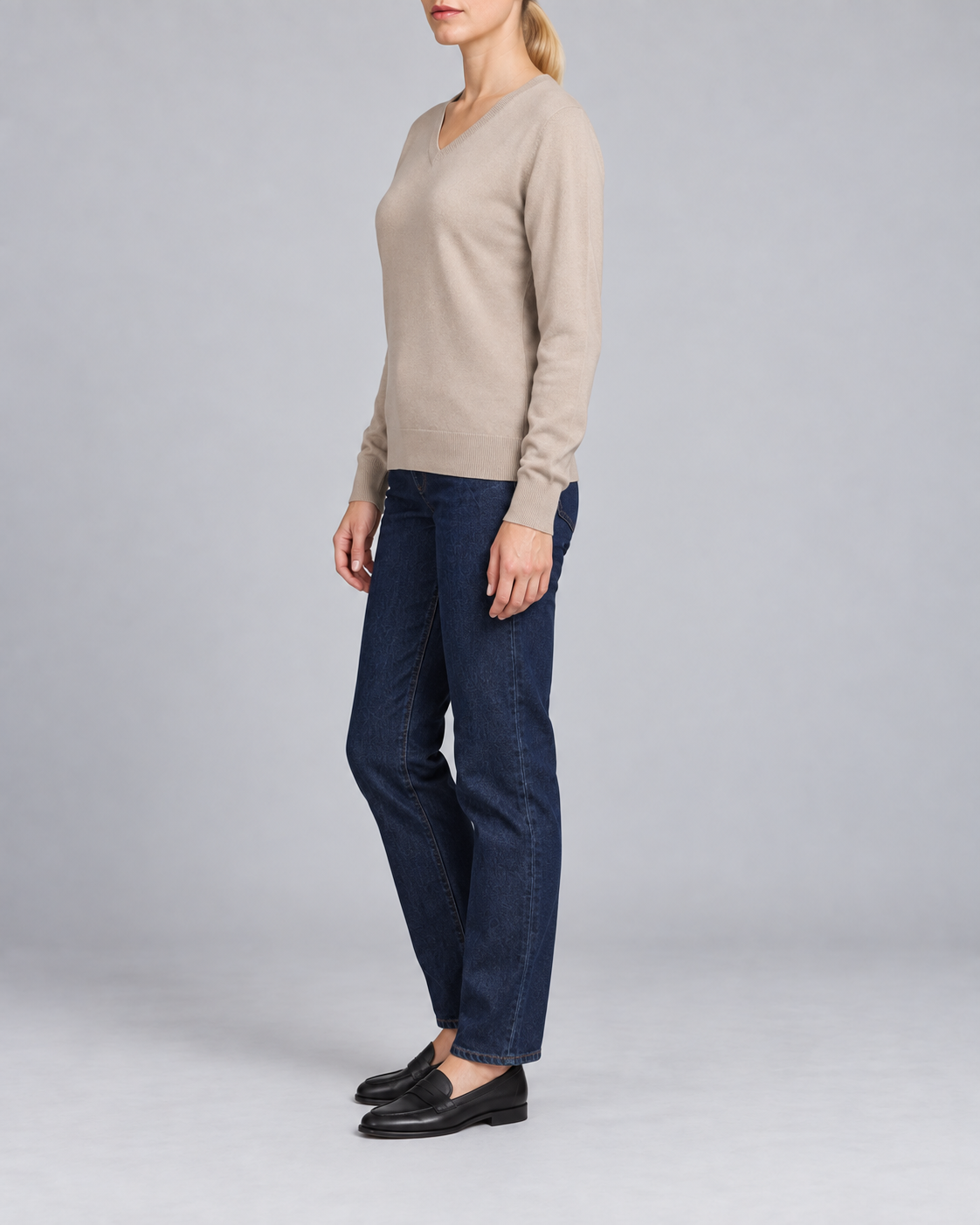 Side view showing the Taupe classic fit and long sleeves of Soft Angle V-Neck Sweater in Taupe.