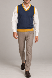 Quiet Layer V-Neck Vest in Navy with Mustard Trim, elegantly layered on a male model, full outfit front view.