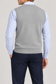 Quiet Layer V-Neck Vest in Grey, elegantly layered on a male model, rear three-quarter view.