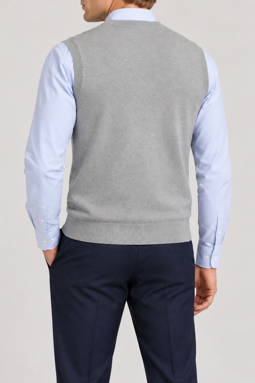Quiet Layer V-Neck Vest in Grey, elegantly layered on a male model, rear three-quarter view.