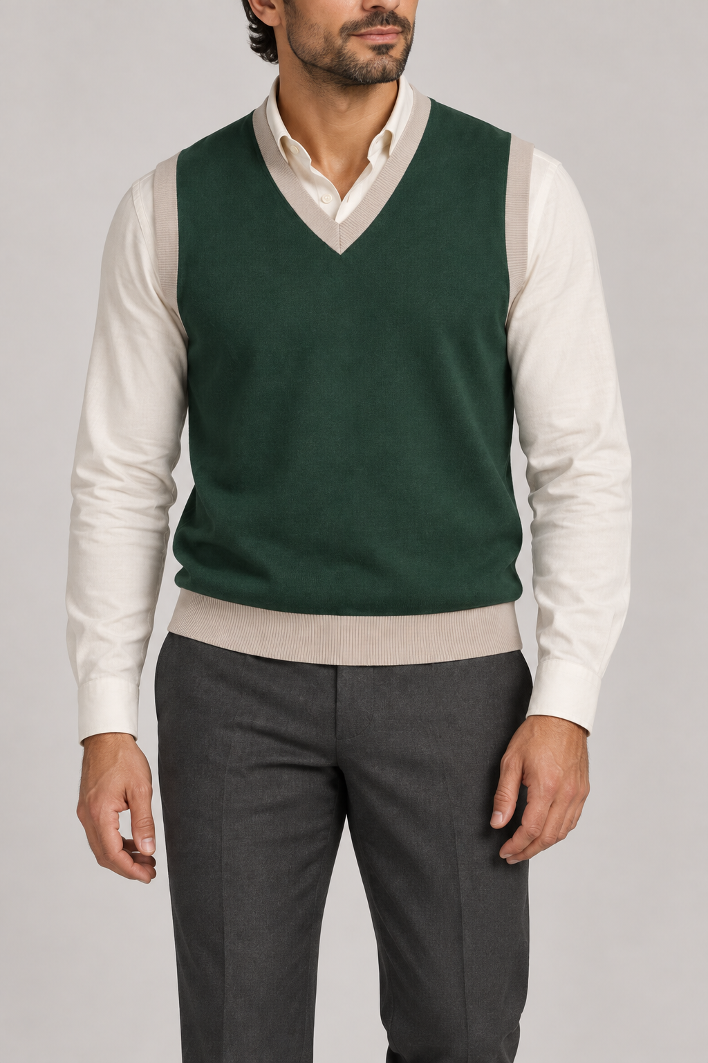 Quiet Layer V-Neck Vest in Pine with Coco Trim, elegantly layered on a male model, close front hero.