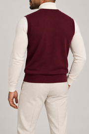 Quiet Layer V-Neck Vest in Burgundy, elegantly layered on a male model, rear three-quarter view.
