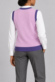 Soft Outline V-Neck Vest in Lilac with Violet Trim, elegantly layered on a female model, rear three-quarter view.