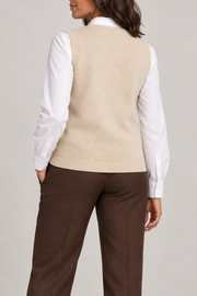 Soft Outline V-Neck Vest in Beige, elegantly layered on a female model, rear three-quarter view.