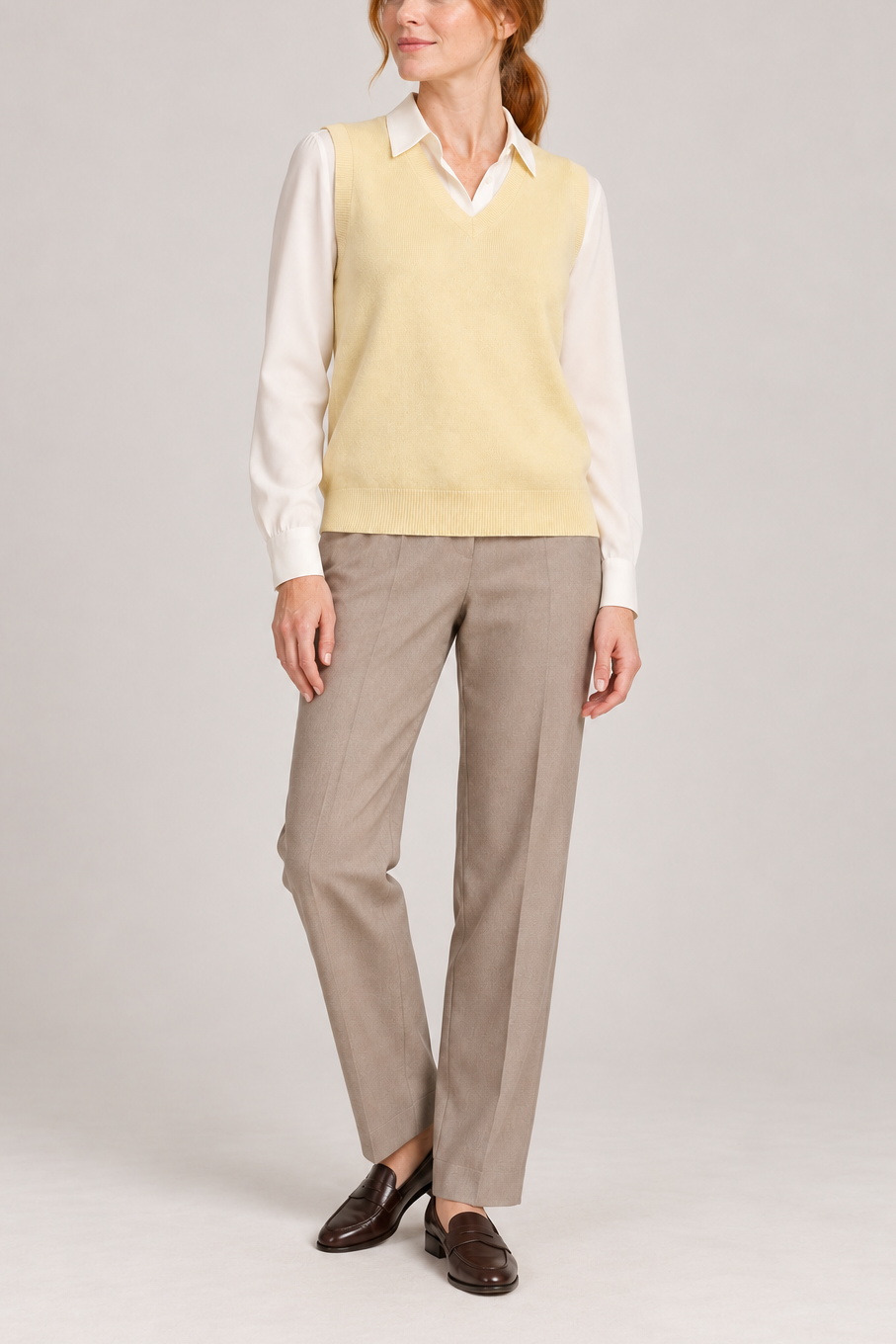 Soft Outline V-Neck Vest in Mellow, elegantly layered on a female model, full outfit front view.