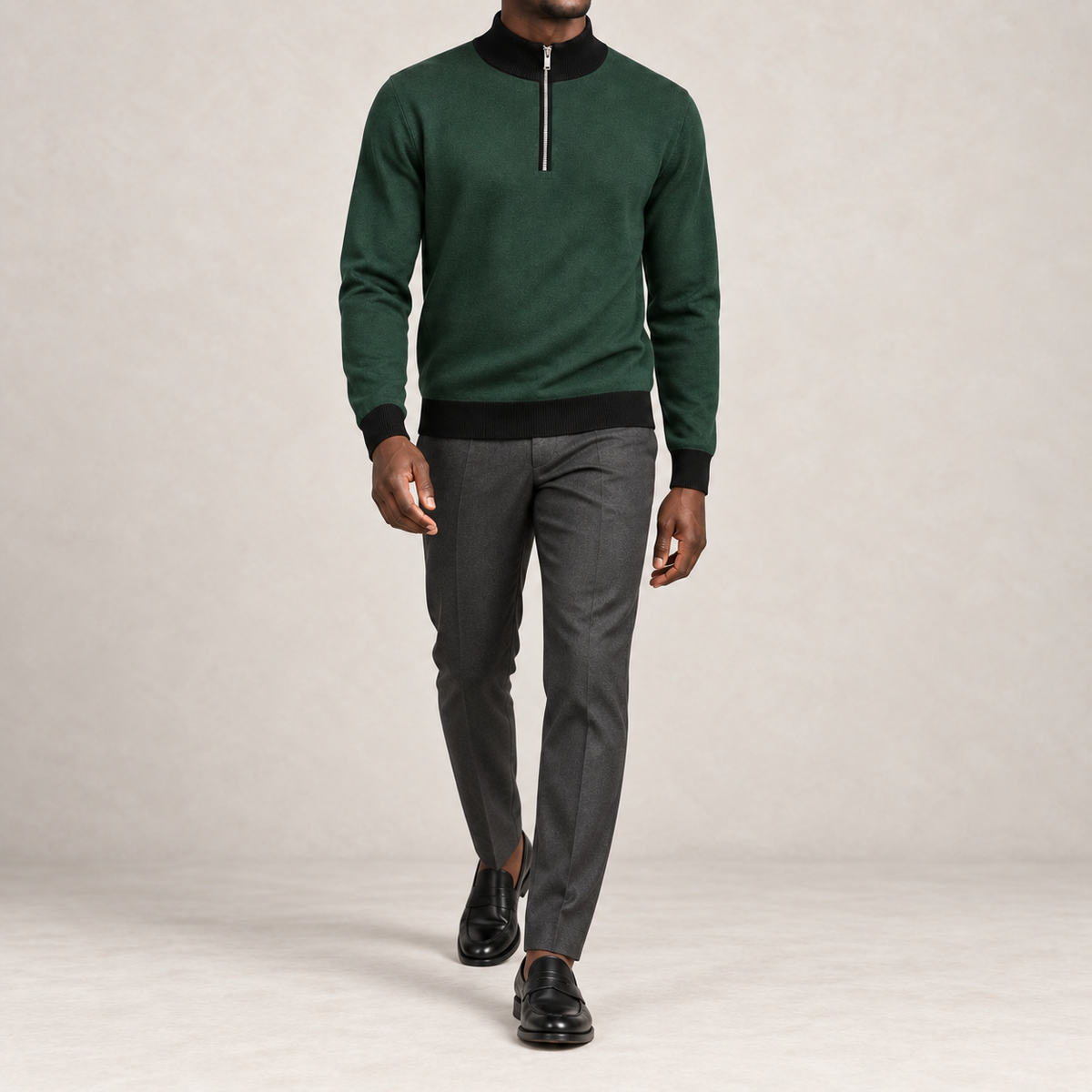 Walking studio view showing the Pine knit drape and black edges of Open Pace Quarter-Zip in Pine with Black Trim.