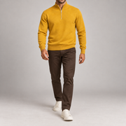 Walking studio view showing the Mustard knit drape and long sleeves of Open Pace Quarter-Zip Sweater in Mustard.