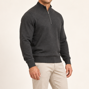Three-quarter studio view showing the Charcoal silhouette and cuffs of Open Pace Quarter-Zip Sweater in Charcoal.