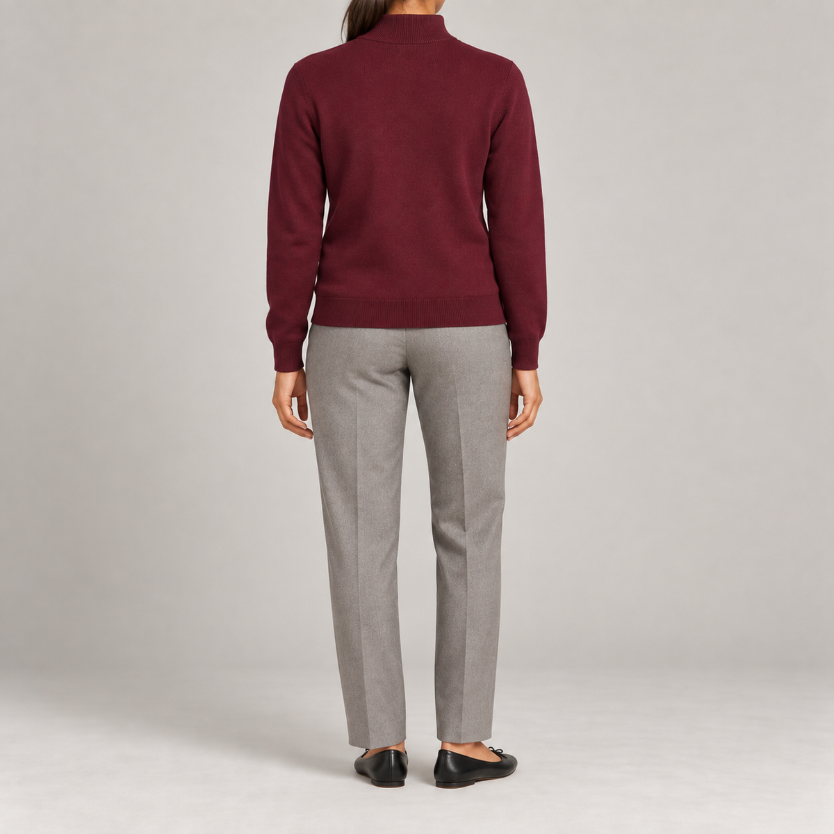 Rear studio view showing the plain Burgundy back and tonal ribbed hem of Soft Pace Quarter-Zip Sweater in Burgundy.