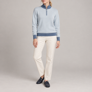 Front studio view showing Powder knit and contrasting Denim collar cuffs and hem of Soft Pace Quarter-Zip in Powder with Denim Trim.