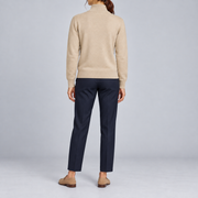 Rear studio view showing the Beige back and tonal ribbed hem of Soft Pace Quarter-Zip Sweater in Beige.