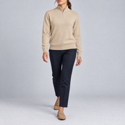 Walking studio view showing Beige knit drape and long sleeves of Soft Pace Quarter-Zip Sweater in Beige.