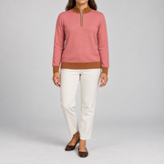 Front studio view showing Coral knit with Rust collar cuffs and hem of Soft Pace Quarter-Zip in Coral with Rust Trim.
