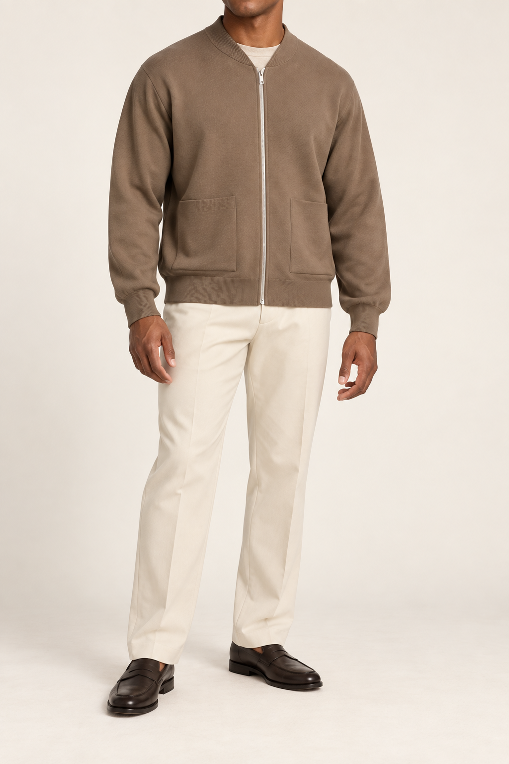 Front studio view showing full zip and front pockets of Afterlight Knit Bomber in Peanut.