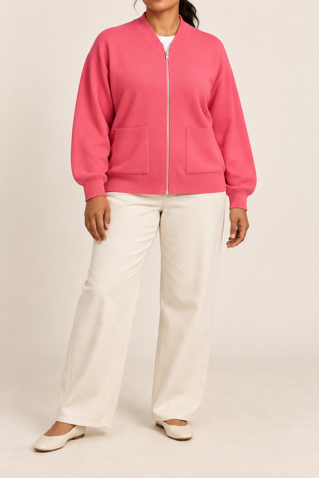 Front studio view showing full zip and front pockets of Soft Afterlight Knit Bomber in Hot Pink.