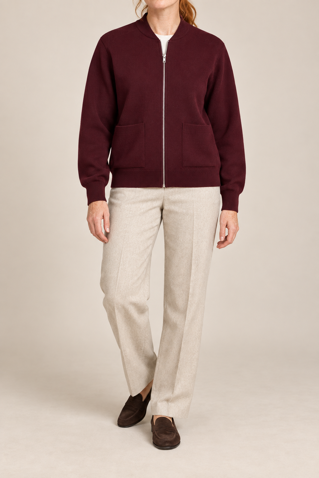 Front studio view showing full zip and front pockets of Soft Afterlight Knit Bomber in Burgundy.