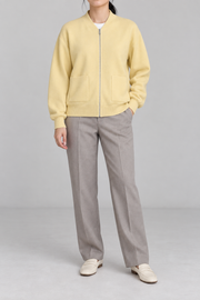 Front studio view showing full zip and front pockets of Soft Afterlight Knit Bomber in Mellow.