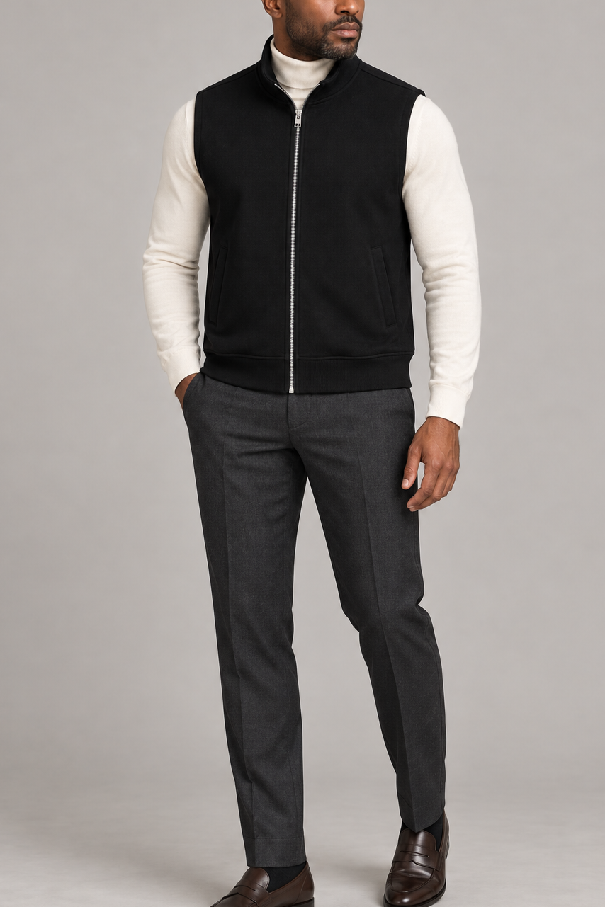Still Form Zip Vest in Black, elegantly layered on a male model, full outfit front view.