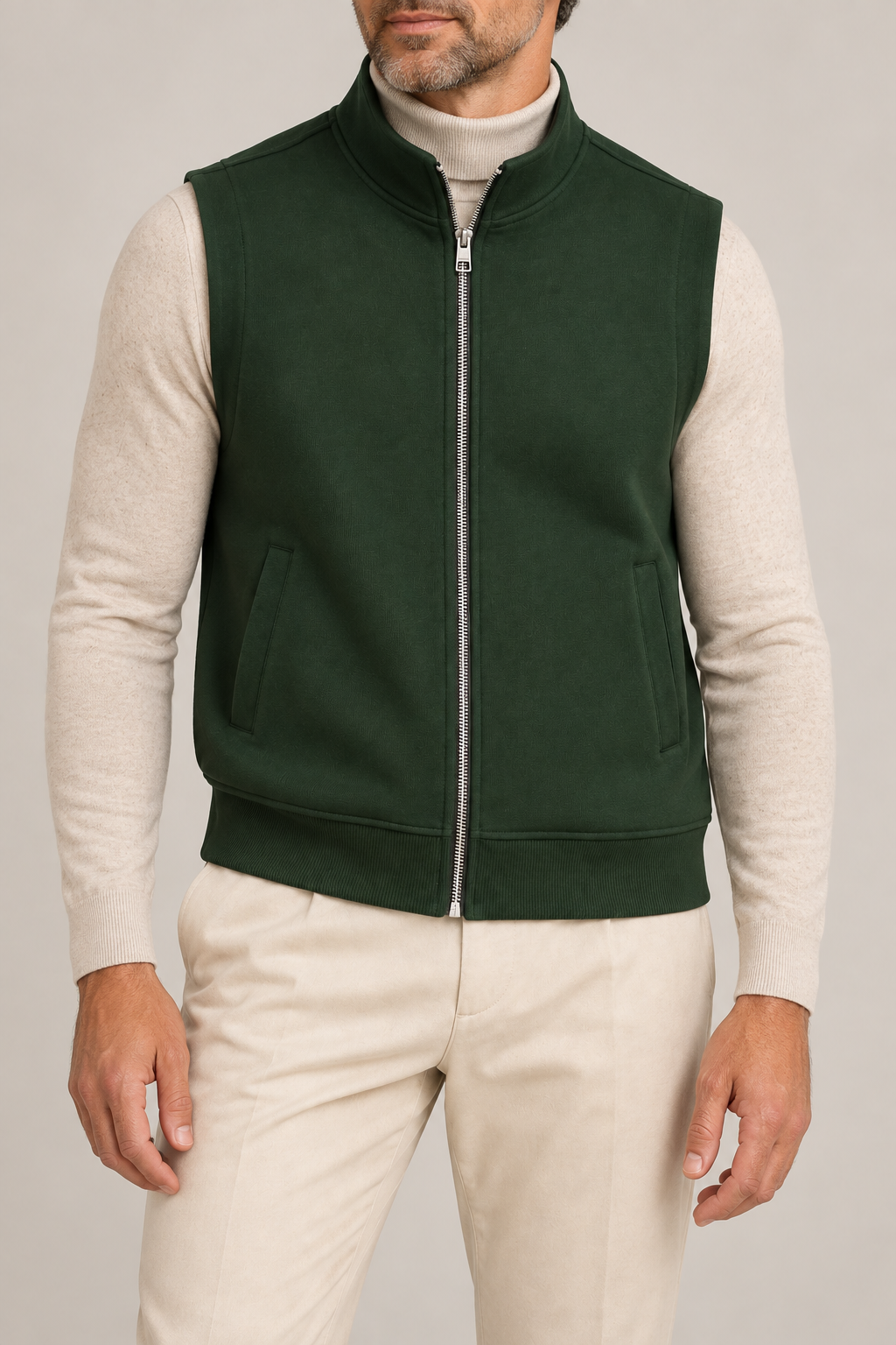 Still Form Zip Vest in Dark Green, elegantly layered on a male model, close front hero.