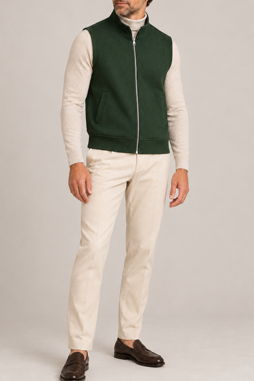 Still Form Zip Vest in Dark Green, elegantly layered on a male model, full outfit front view.