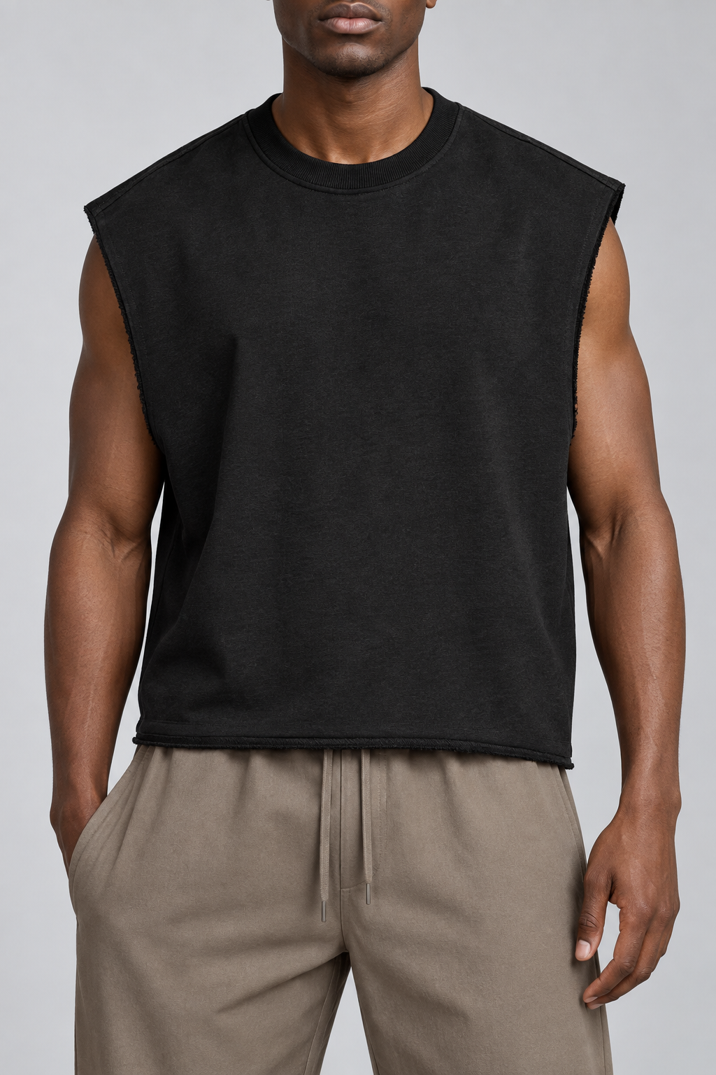 Front view of Raw Form Terry Tank in Black, showing the plain boxy shape, broad shoulders and round neck.
