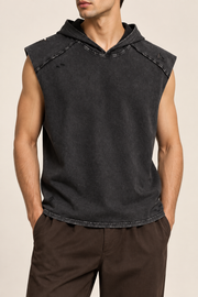 Front view of Soft Static Hooded Tank in Black, showing the washed finish, raw shoulder panels and distressed accents.