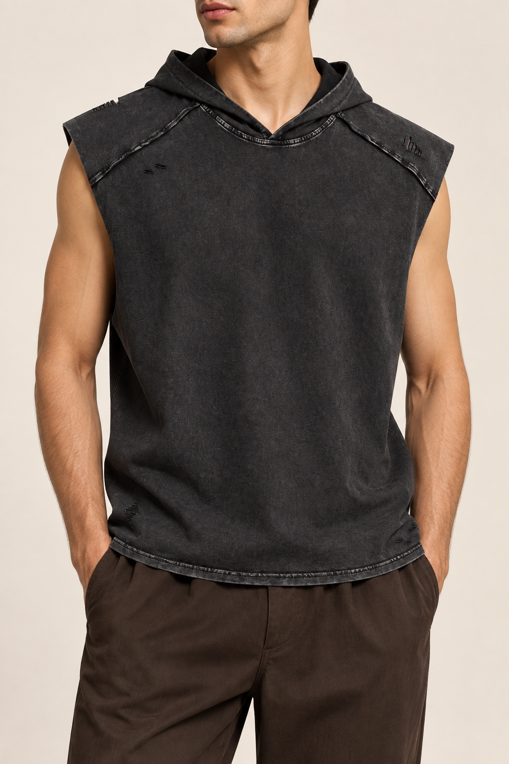 Front view of Soft Static Hooded Tank in Black, showing the washed finish, raw shoulder panels and distressed accents.