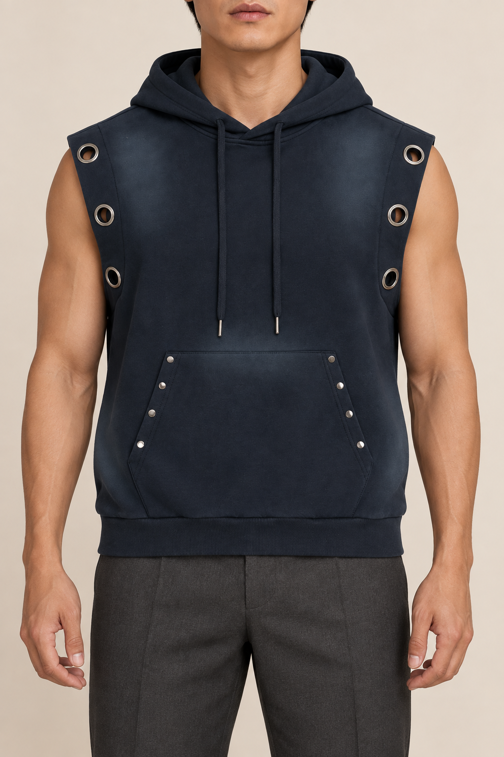 Front studio view of Night Current Sleeveless Hoodie in Navy Blue, showing metal eyelets, drawstrings and the studded pocket.