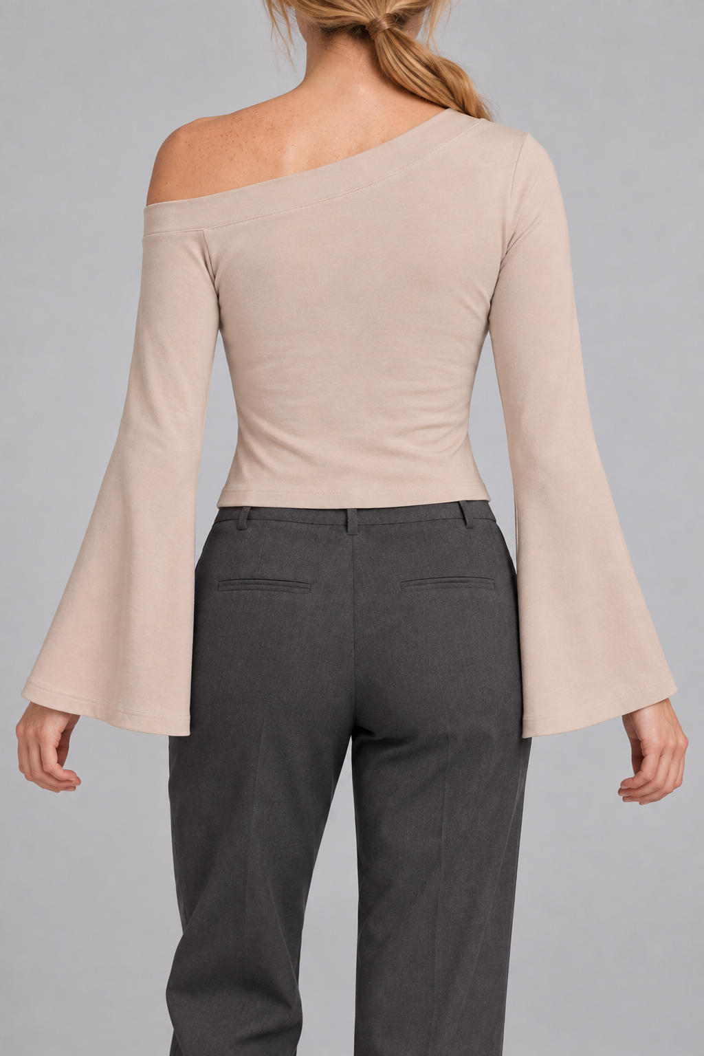 Quiet Arc Bell Sleeve Top in Pale Khaki. Rear view showing the plain back and open left shoulder.
