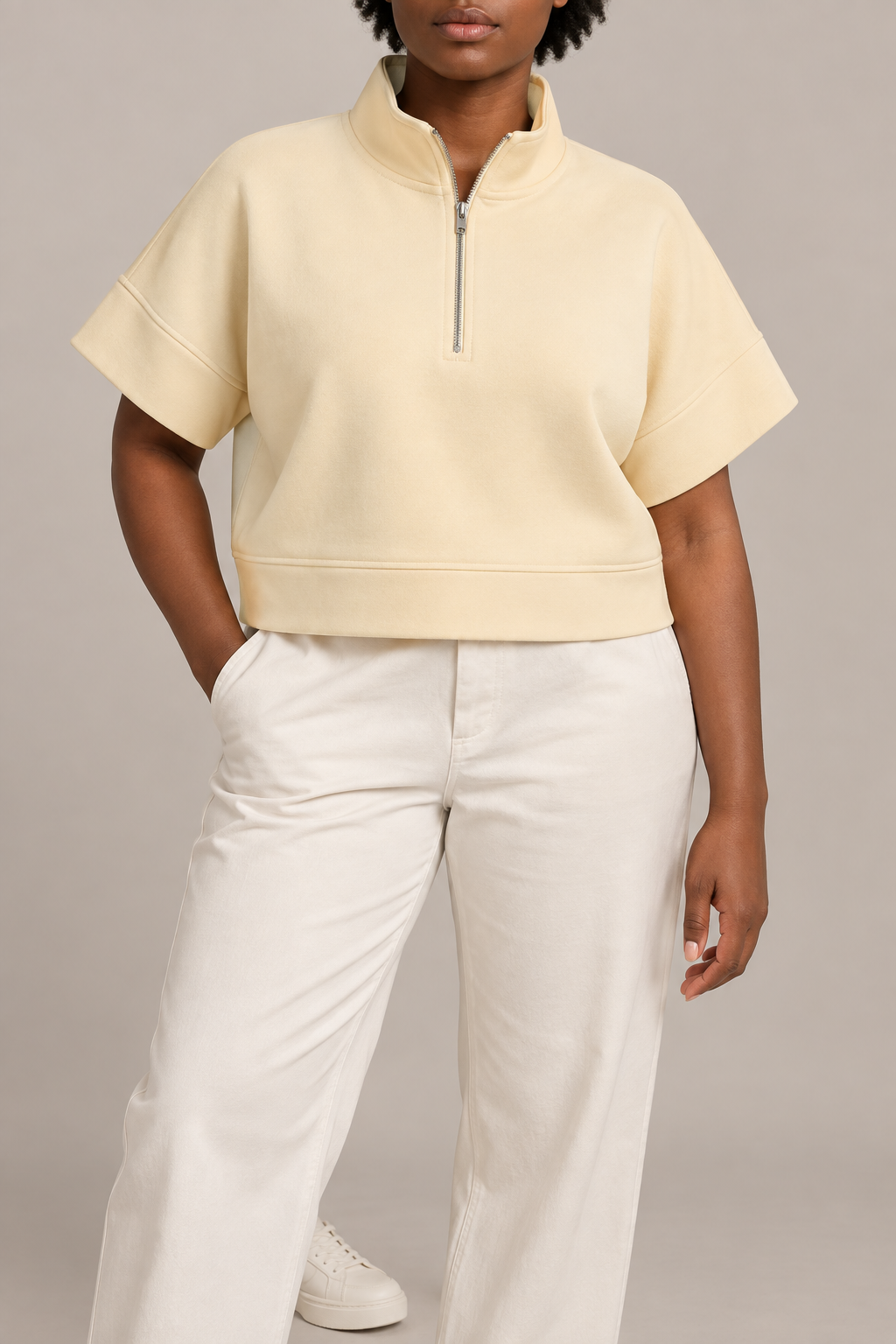 Soft Interval Zip Sweatshirt in Apricot. Front view showing the short metal zip and wide short sleeves.
